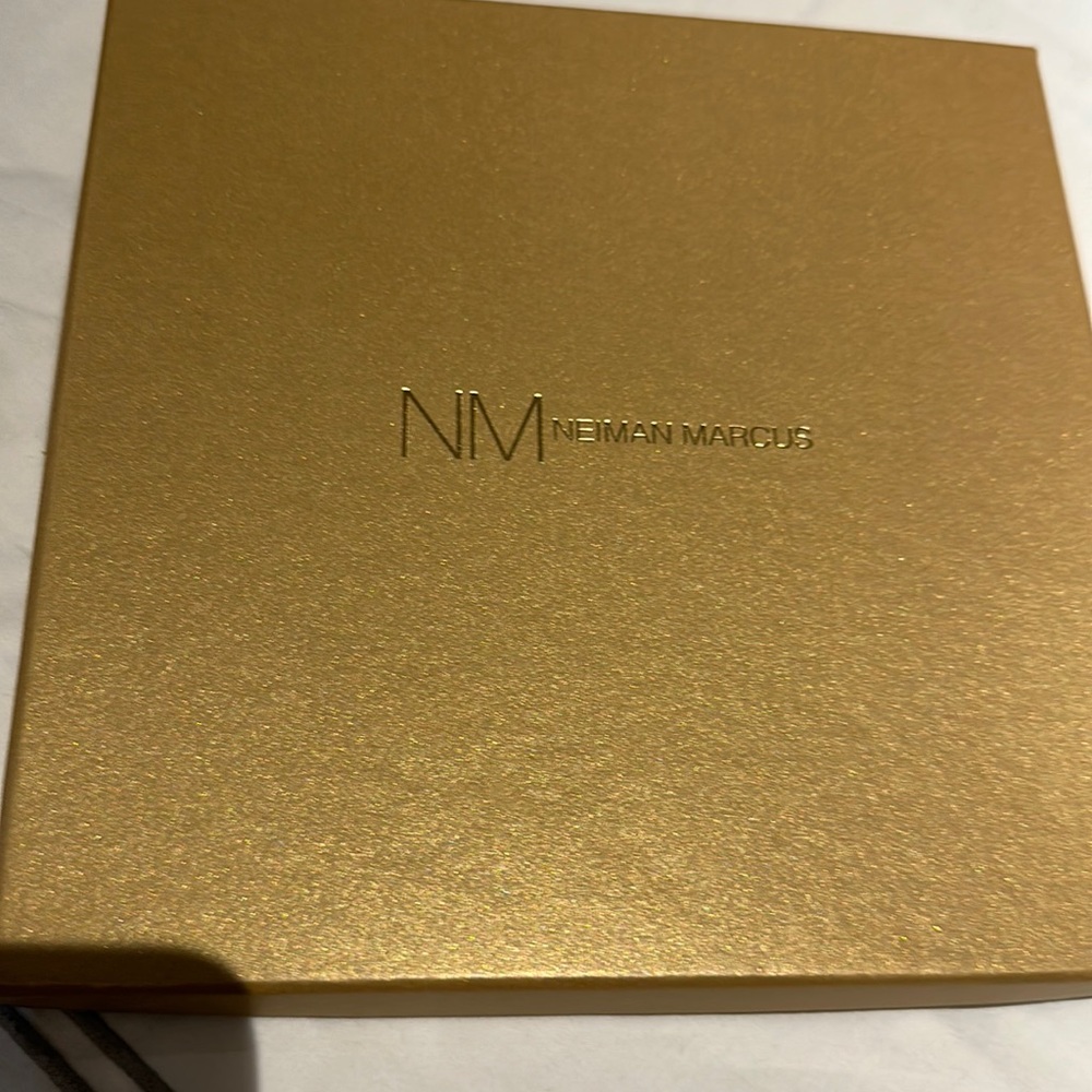 Small thin box from Neiman Marcus. Perfect for gifts I.e, pocket squares.